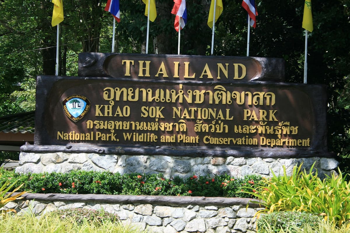 Sign of Khao Sok National Park at the park entrance